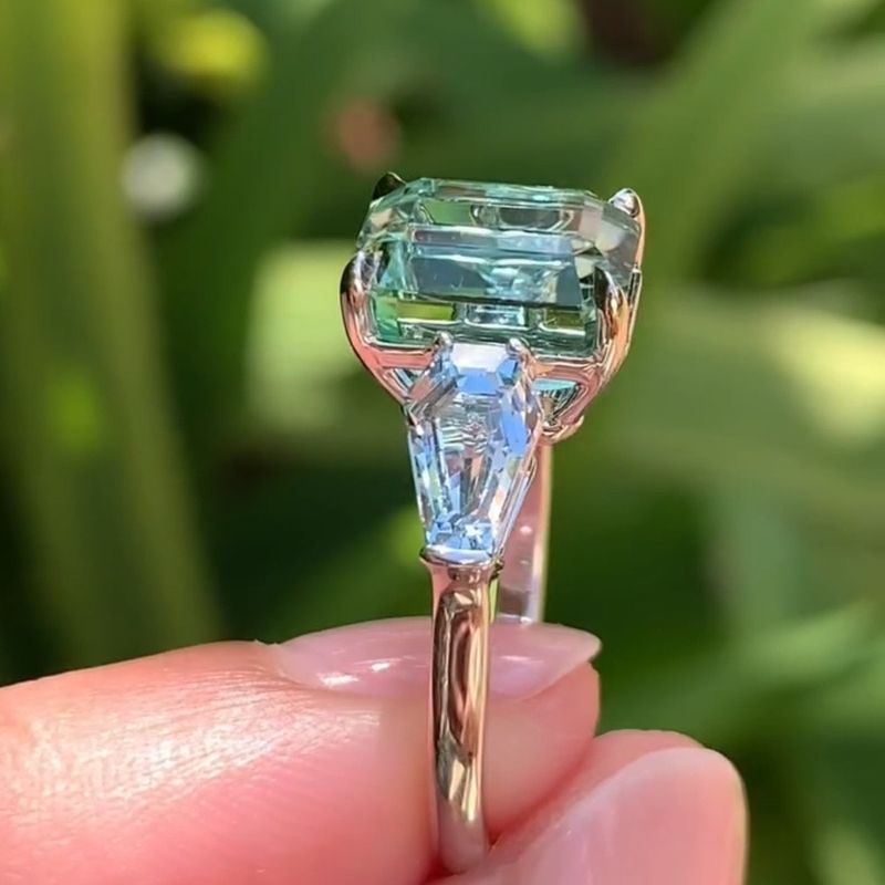 Mindy 11.19 Carat Emerald Cut Blue Three Stone Engagement Ring