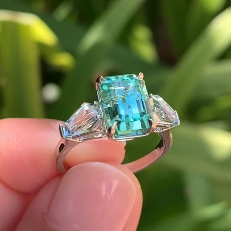 Mindy 11.19 Carat Emerald Cut Blue Three Stone Engagement Ring