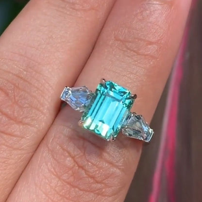 Mindy 11.19 Carat Emerald Cut Blue Three Stone Engagement Ring