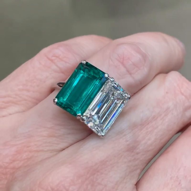Mia 10ct Emerald Cut White Sapphire and Green Emerald Two Stone Engagement Ring