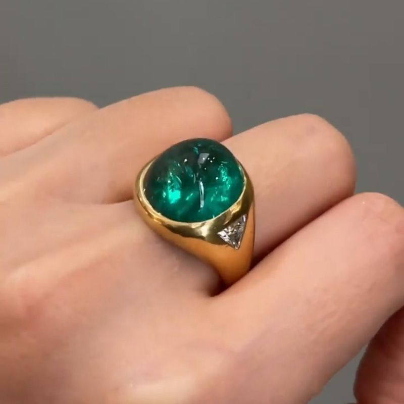 Zoya 9.5ct Cabochon Emerald With with Triangular Cut White Sapphire Shoulders Yellow Gold Ring