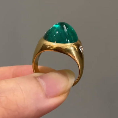 Zoya 9.5ct Cabochon Emerald With with Triangular Cut White Sapphire Shoulders Yellow Gold Ring