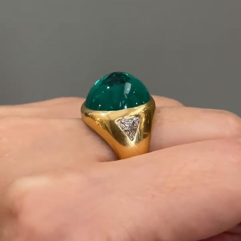 Zoya 9.5ct Cabochon Emerald With with Triangular Cut White Sapphire Shoulders Yellow Gold Ring